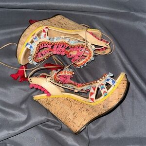 Colorfully bejeweled ankle strap wedges by Schutz